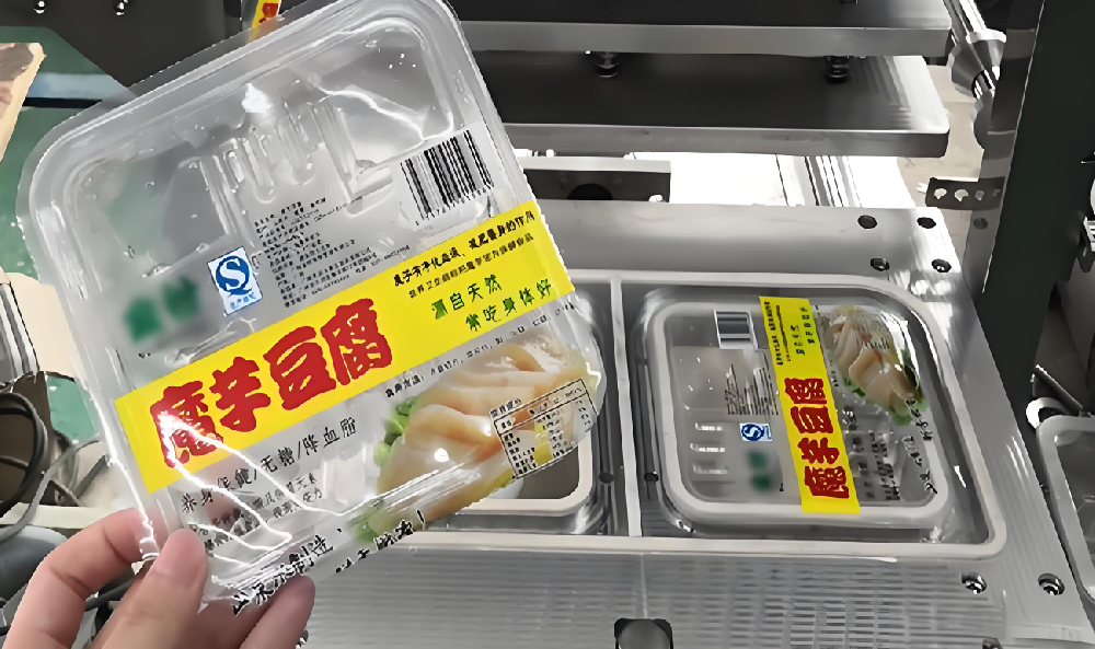 龙应一出三魔芋豆腐灌装封口机